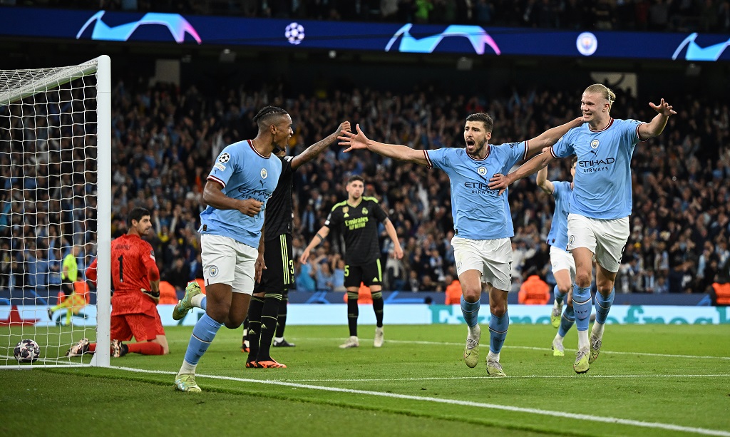 فرحة لاعبي مانشستر سيتي بتسجيل هدف في شباك ريال مدريد (تصوير: أ ف ب)